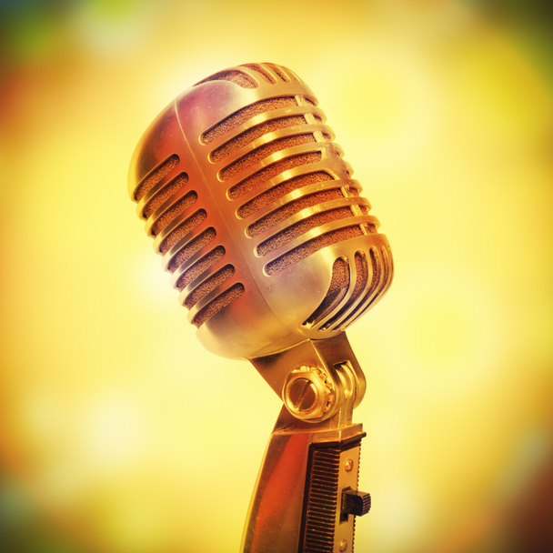 Microfone de palco em um fundo brilhante
  - Foto, Imagem
