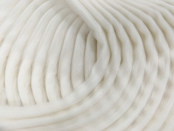 Top in lana per il processo di filatura
 - Foto, immagini