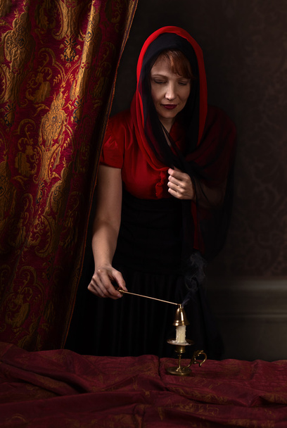  woman with candlestick - Valokuva, kuva