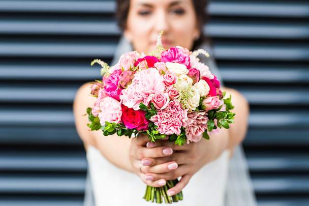 Beautiful wedding bouquet in hands of the bride - Φωτογραφία, εικόνα