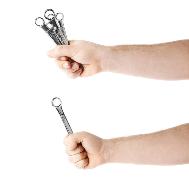 Set of hand holding a wrench tools, composition isolated over the white background - Foto, afbeelding