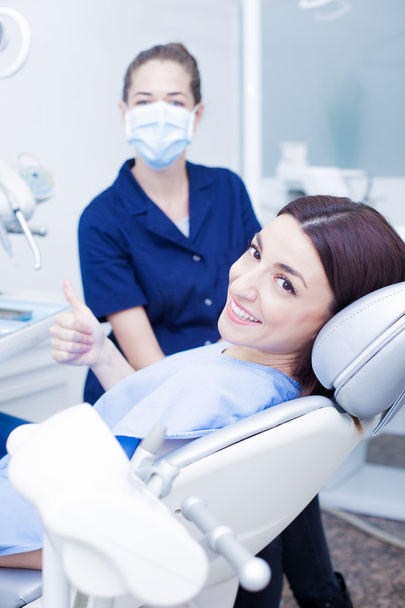 Woman visiting her dentist - Фото, зображення