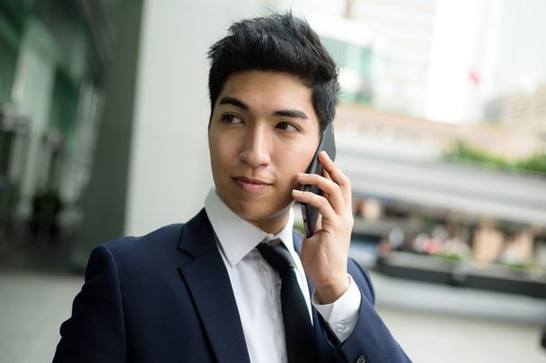 Jonge Aziatische zakenman in pak - Foto, afbeelding
