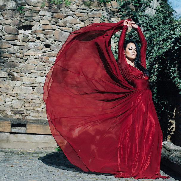 Woman in red dress outdoor - Φωτογραφία, εικόνα