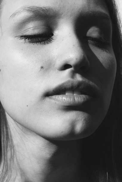Face of a meditative young woman - Fotografie, Obrázek