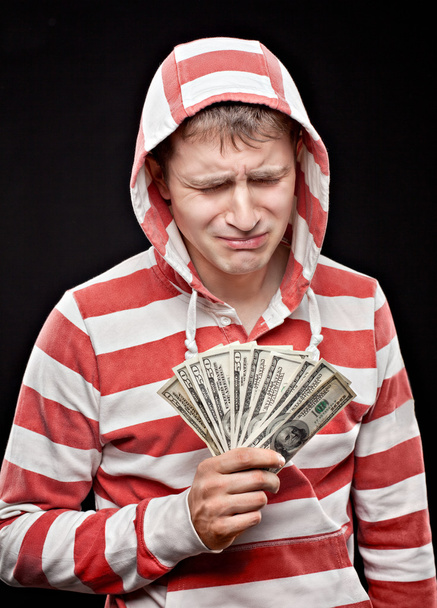 Crying young man with money - Фото, зображення