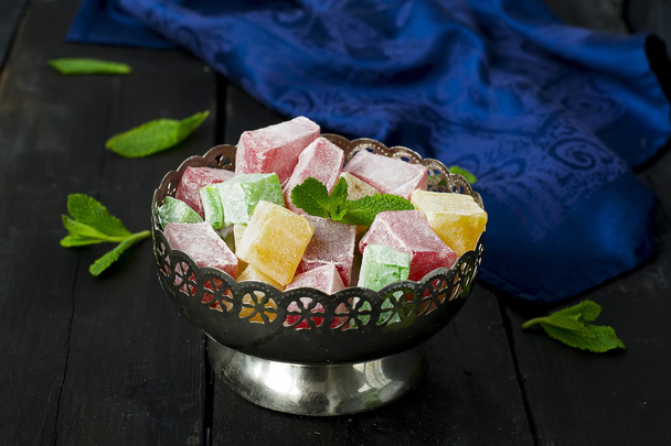 lokum - traditional Turkish sweets on a dark background - Photo, Image