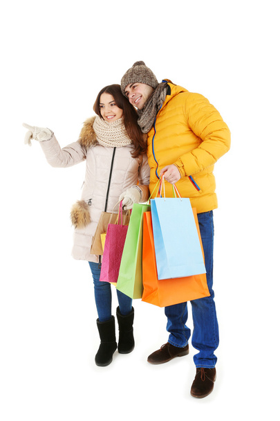 couple with colorful shopping bags - Фото, изображение