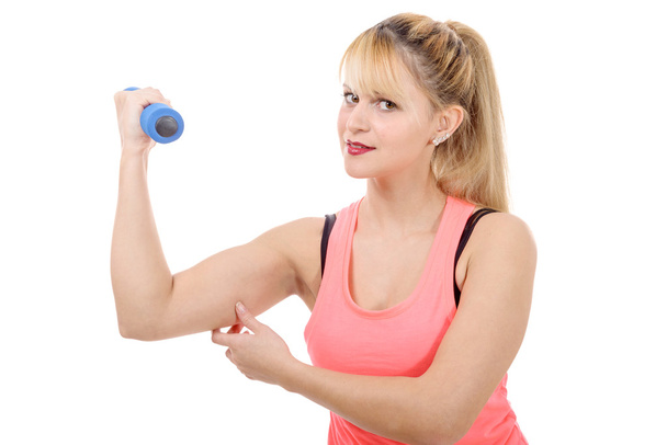 portrait of pretty sporty girl holding weight - Photo, Image