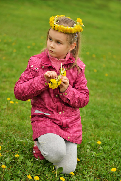 Young girl with dandelion chaplet - Photo, Image