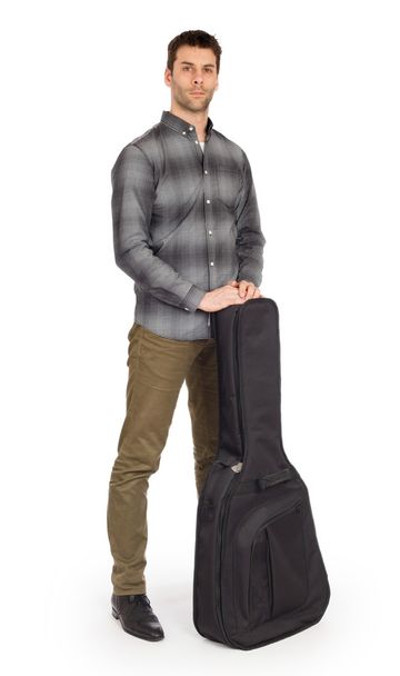 Musican with acoustic guitar in bag - Foto, Imagem