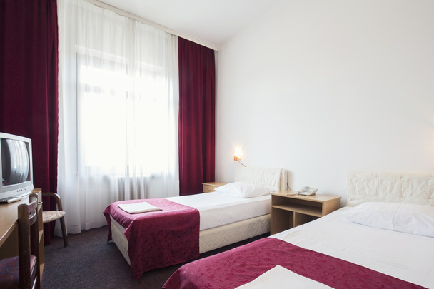 Interior of a hotel room with two beds - Foto, Bild