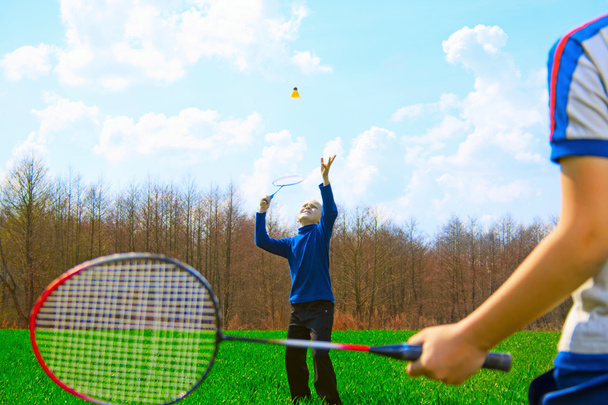 Family - two little boys playing badminton - 写真・画像