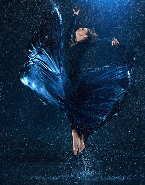 The young beautiful modern dancer dancing under water drops - Photo, Image
