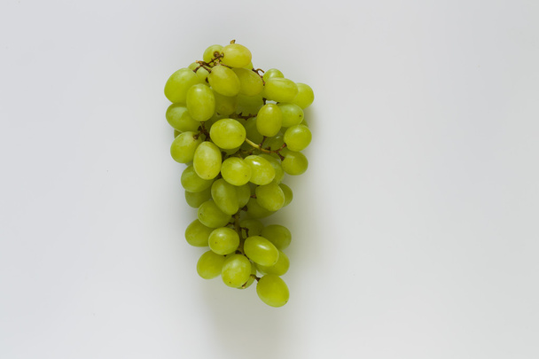 Bunch of grapes on a white background - Photo, Image