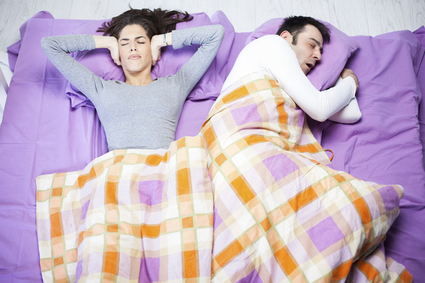 man snoring and woman can not sleep - Foto, Imagem