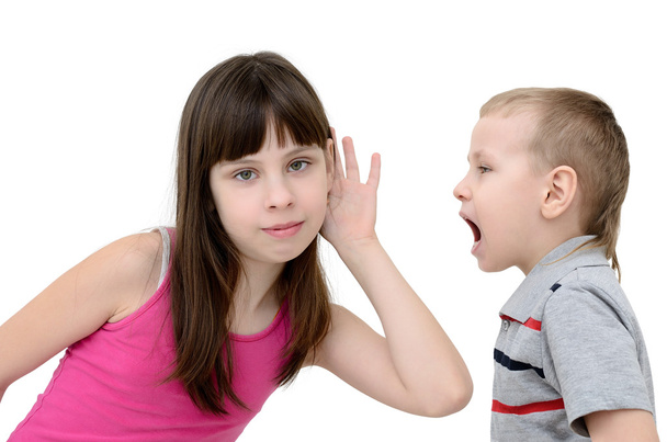 Girl listens to a boy on white background - Photo, Image