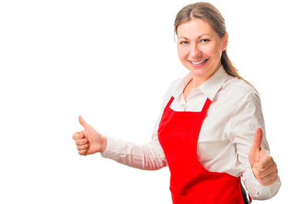 ευτυχισμένη γυναίκα σε μια κόκκινη ποδιά είναι ικανοποιημένοι - Φωτογραφία, εικόνα