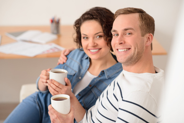 Pleasant couple drinking coffee - Zdjęcie, obraz
