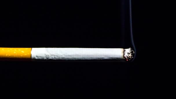 Időközű parázsló cigaretta - Felvétel, videó