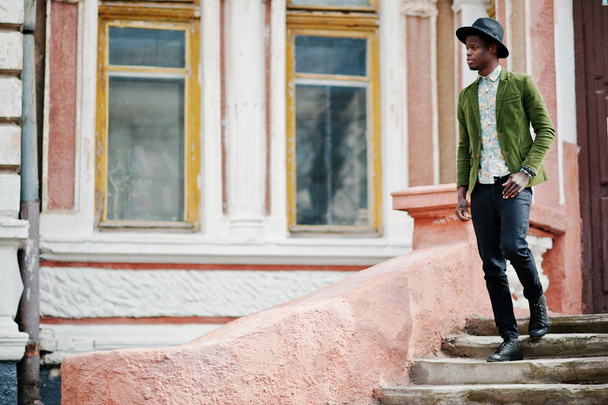 Fashion portrait of black african american man on green velvet j - Valokuva, kuva