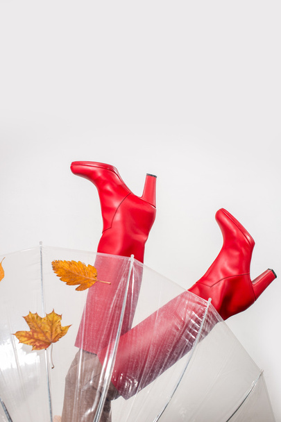 autumn woman legs in high red boots - Фото, изображение
