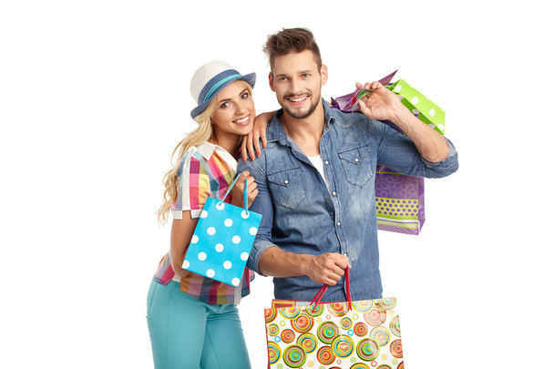 couple with shopping bags - Φωτογραφία, εικόνα