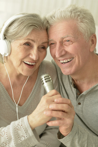 Senior couple with headphones  - Valokuva, kuva