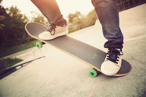 skateboarding legs at skatepark - 写真・画像