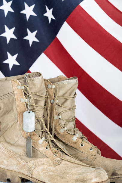 Old combat boots and dog tags with American flag - Photo, Image