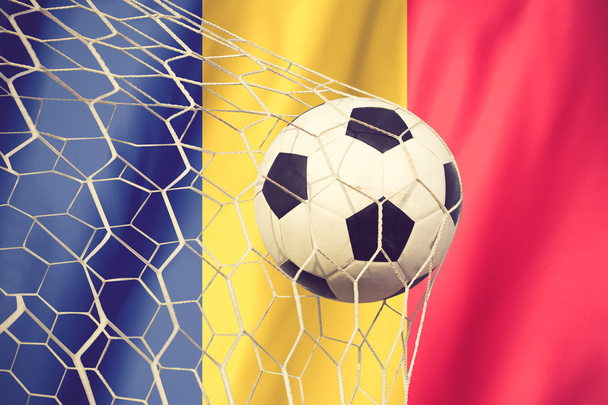 Romania waving flag and soccer ball in goal net vintage color - Photo, Image