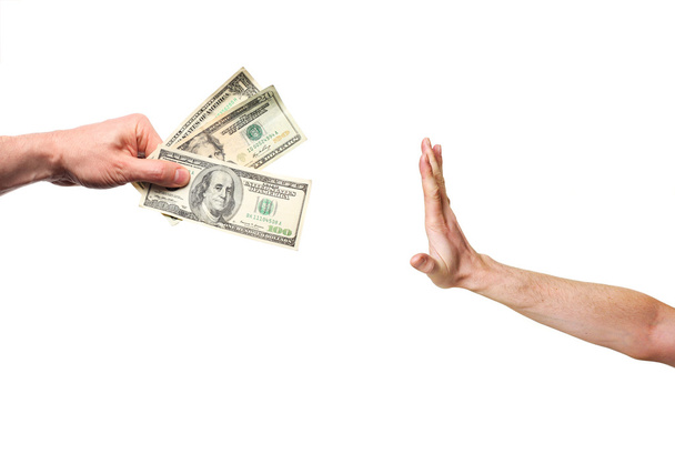 Mão rejeitando dinheiro
 - Foto, Imagem