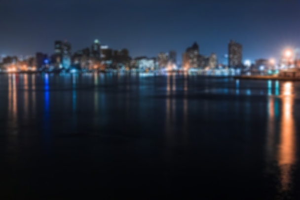 Blurred panorama of a city at night. - Fotoğraf, Görsel