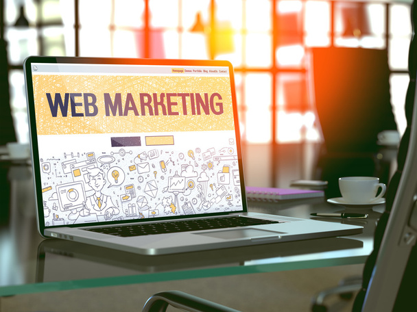 Web Marketing on Laptop in Modern Workplace Background. - Foto, Bild