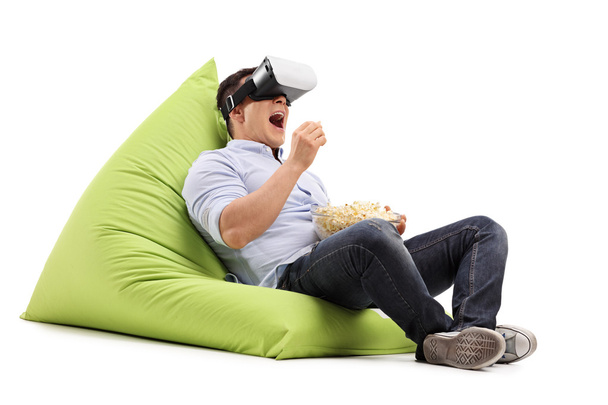 Man watching something on a VR goggles - Фото, зображення