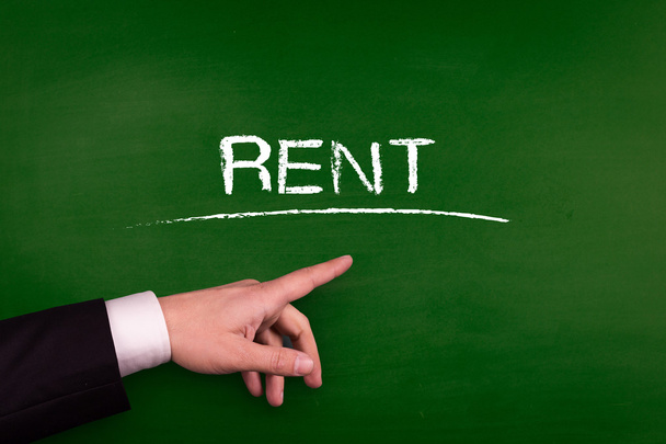 Businessman pointing on rent - Photo, image