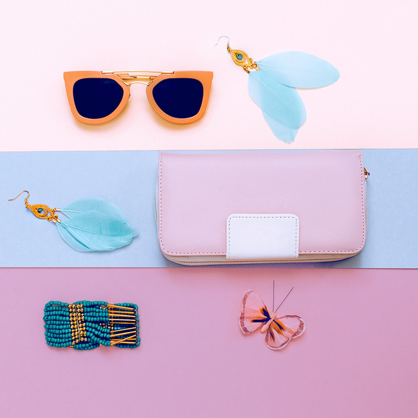Ladies Fashion Accessories. Pink Clutch, sunglasses and jewelry. - 写真・画像