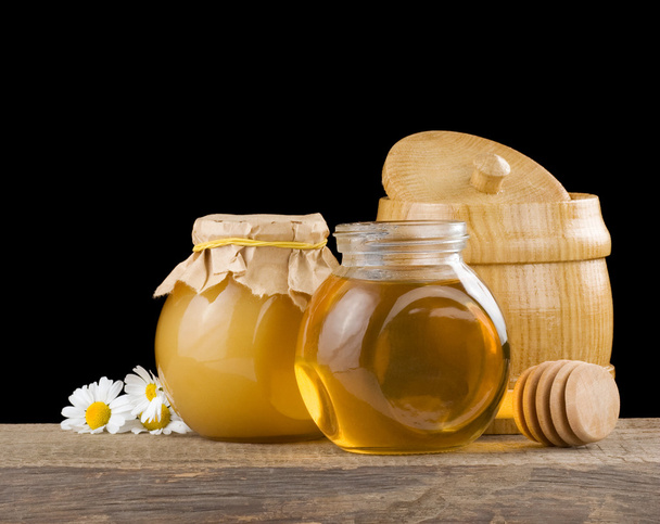 Jar full of honey and stick - Zdjęcie, obraz