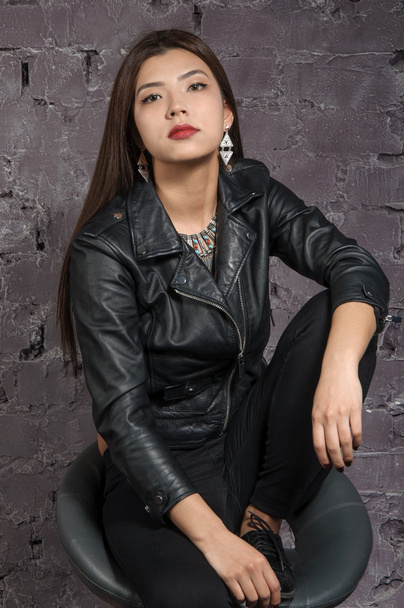 Asian girl wearing a black jacket  - Photo, Image