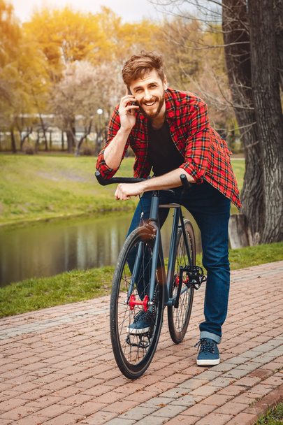 Handsome Young Man With Bicycle - Valokuva, kuva