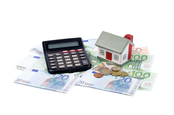 Toy house for euro banknotes as a background - Fotoğraf, Görsel