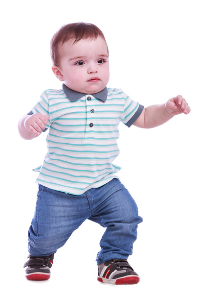 Portrait of small boy in blue trousers - Foto, Imagen