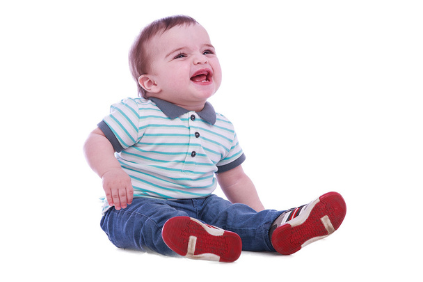 Portrait of small boy in blue trousers - Foto, imagen