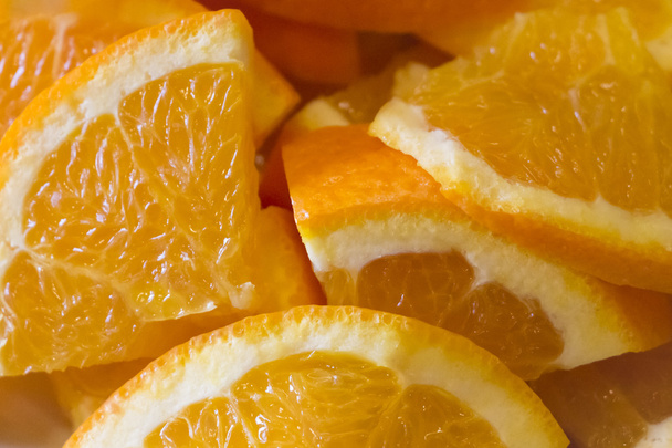 Смачні соковиті апельсинові фруктові скибочки зі здоровими вітамінами
 - Фото, зображення