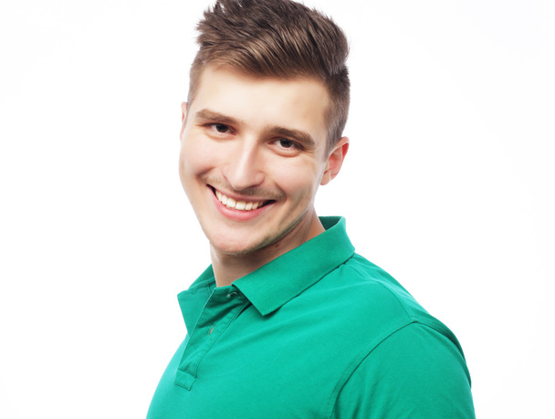 handsome man in blank green t-shirt - Valokuva, kuva