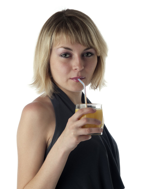 金髪の飲むジュース - 写真・画像