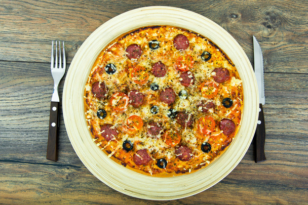 Pepperoni Pizza with Sausage, Cheese, Mozzarella, Olives and Bas - Photo, Image