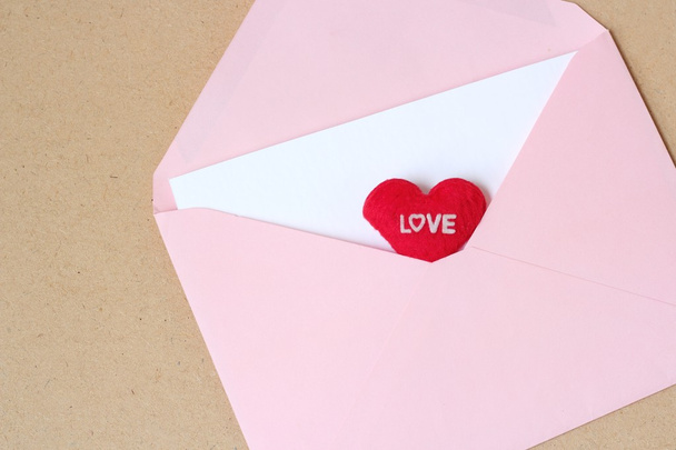 love message with pink open envelope - Foto, imagen