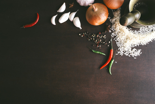 Various spices on wooden background. Top view with copy space - Foto, immagini