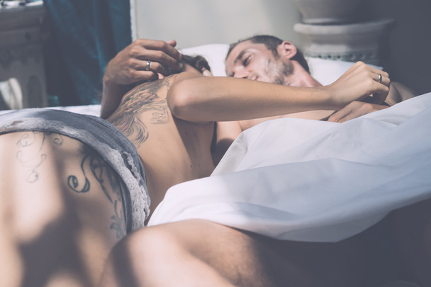 man and woman in the morning in bed  - Foto, Imagen